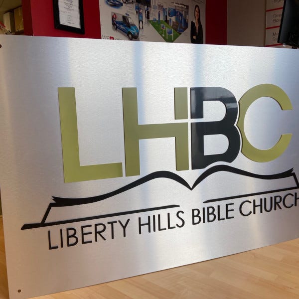 brushed metal sign