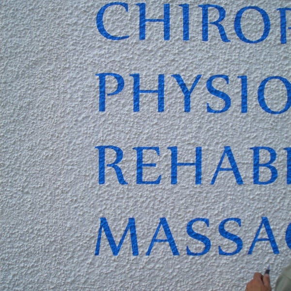 External wall text on textured wall