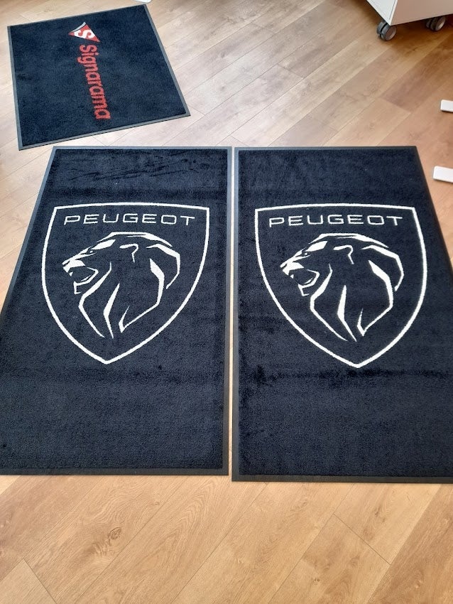 Tapis personnalisé avec logo pour le Garage Gasnier par Signarama Le Mans
