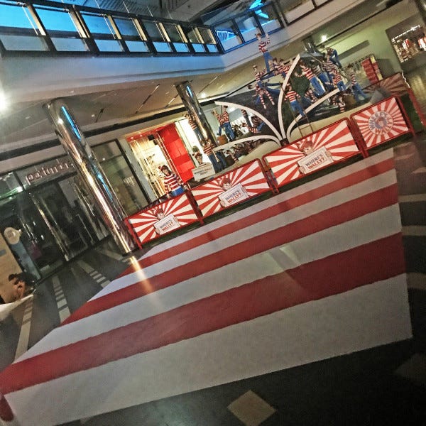 Shopping centre floor graphic in striped red and white pattern for a where's wally event