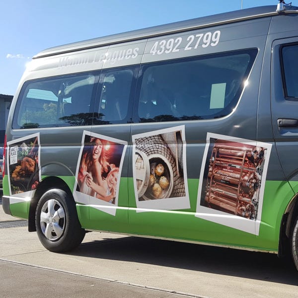 Bus graphic for a league clubs with green and grey base and polaroid image graphics | Signarama Bus Graphics