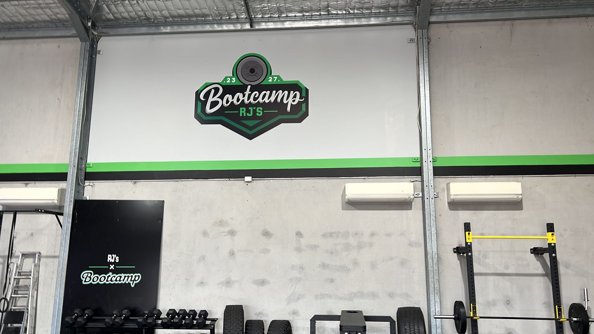 Store signs for Hunter Sports Nutrition and RJ's Bootcamp