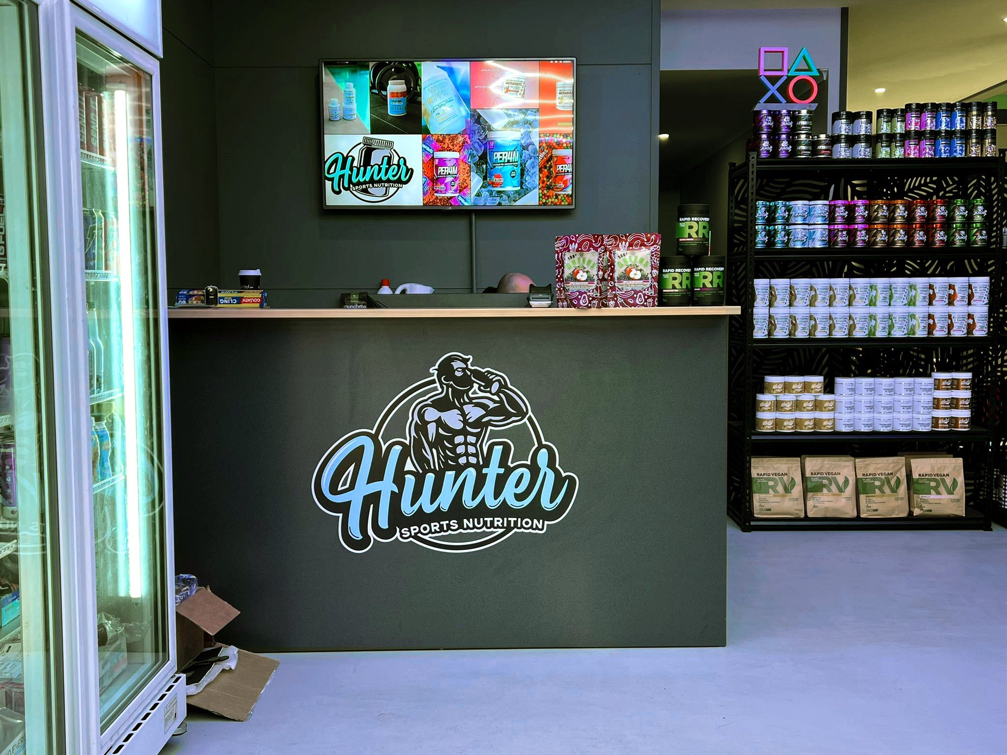 Store signs for Hunter Sports Nutrition and RJ's Bootcamp