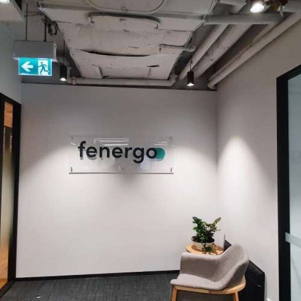 Fenergo_Acrylic Reception sign with stainless steel standoffs and vinyl logo.1