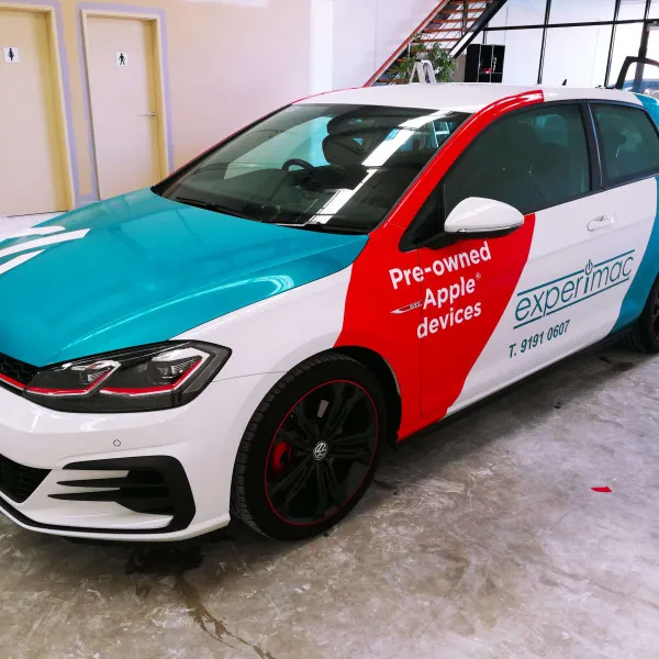 Full car wrapped in bright red and blue branding | Vinyl wraps