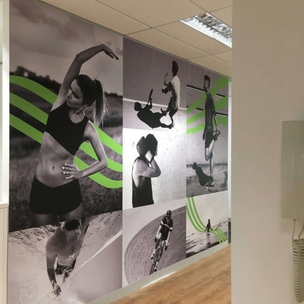 Wall Graphic of health centre in black and white with green accents