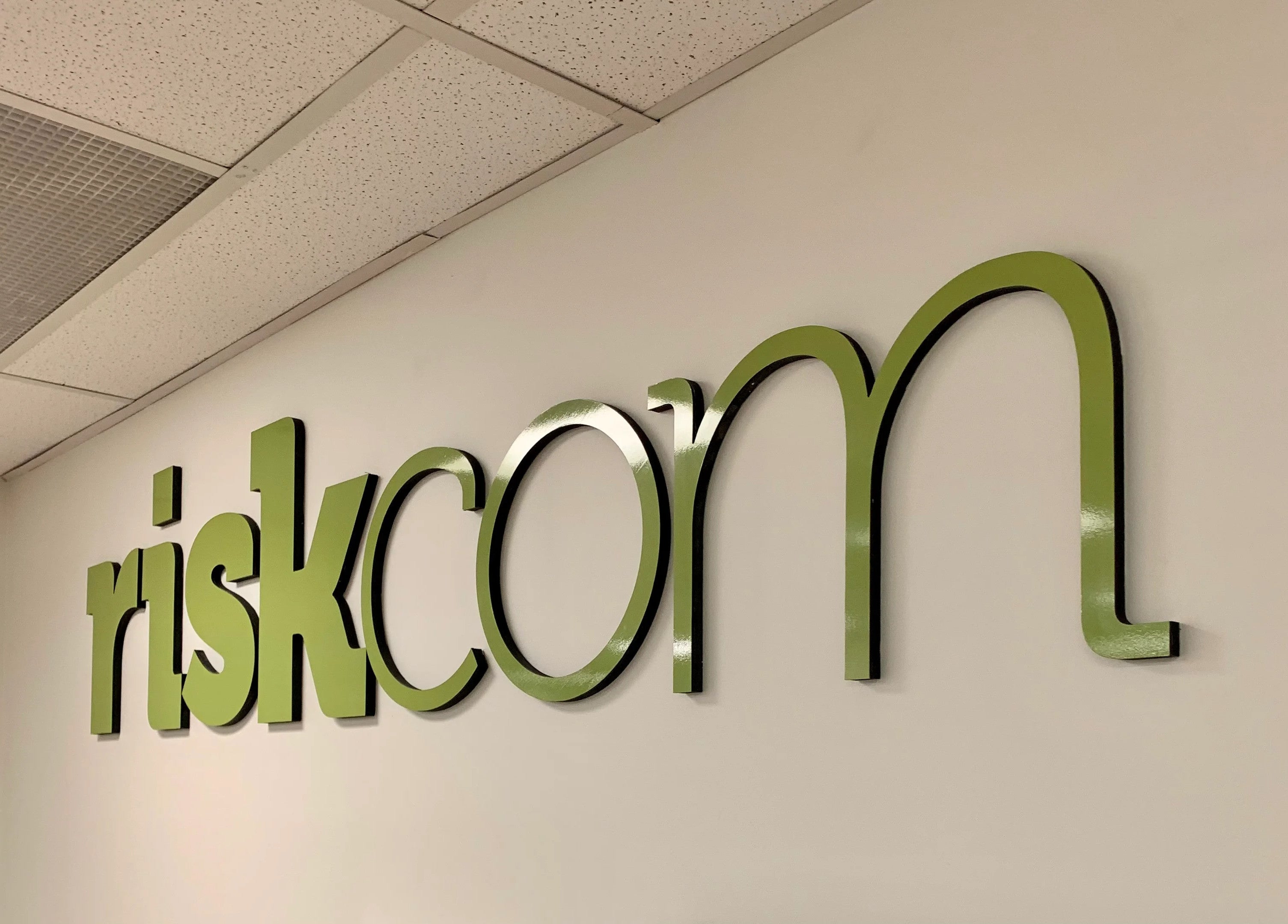 Relocate Reception Signage - Riskcom Group.