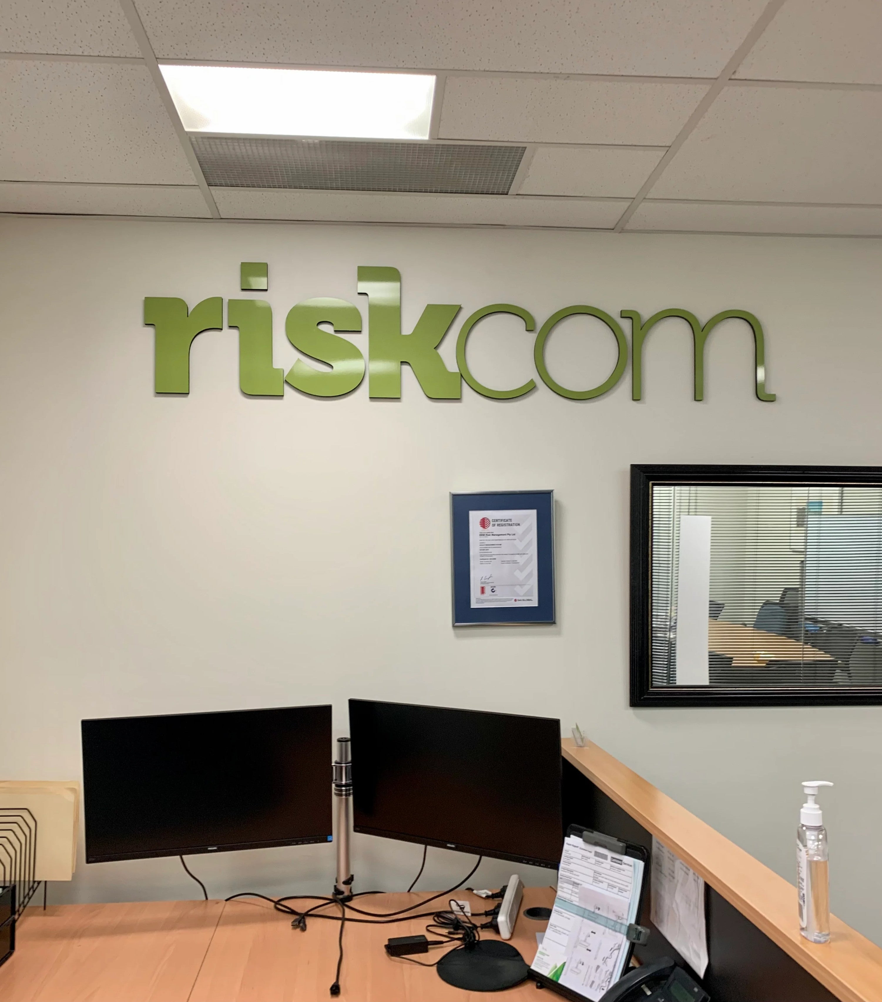 Relocate Reception Signage - Riskcom Group.