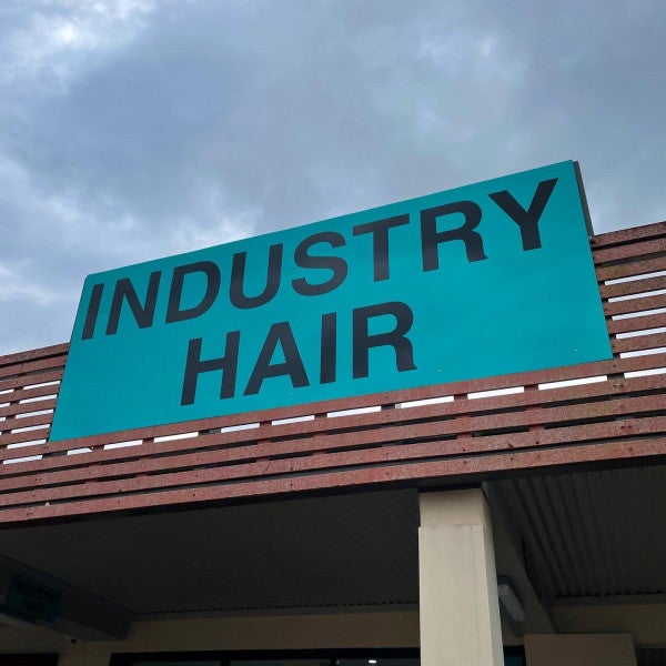 Never underestimate the power of a good hair day - or a good sign