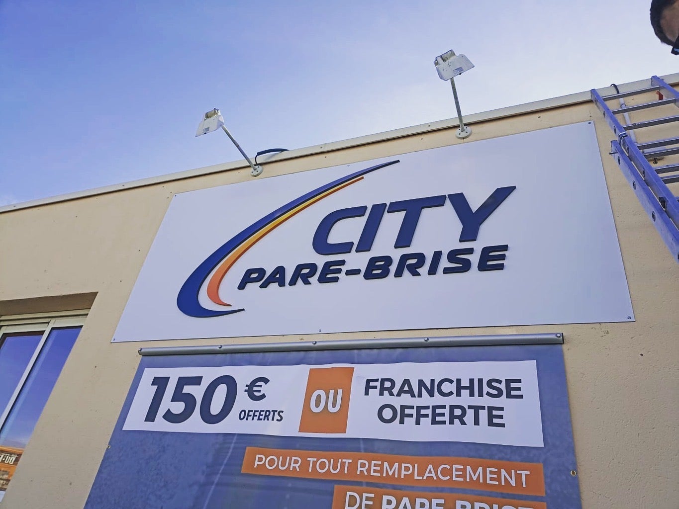 enseigne city pare brise