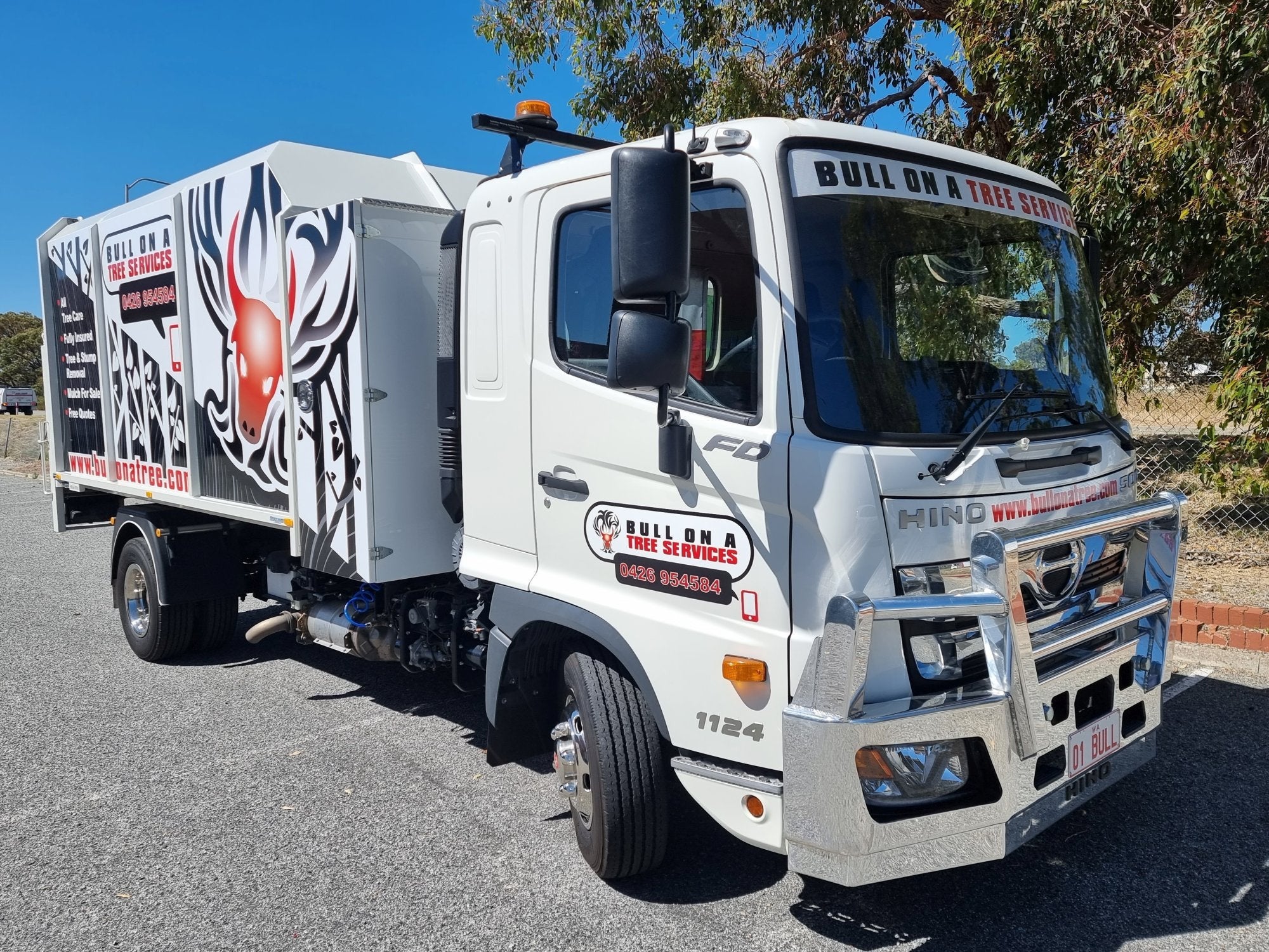 Bull On A Tree Truck Wrap