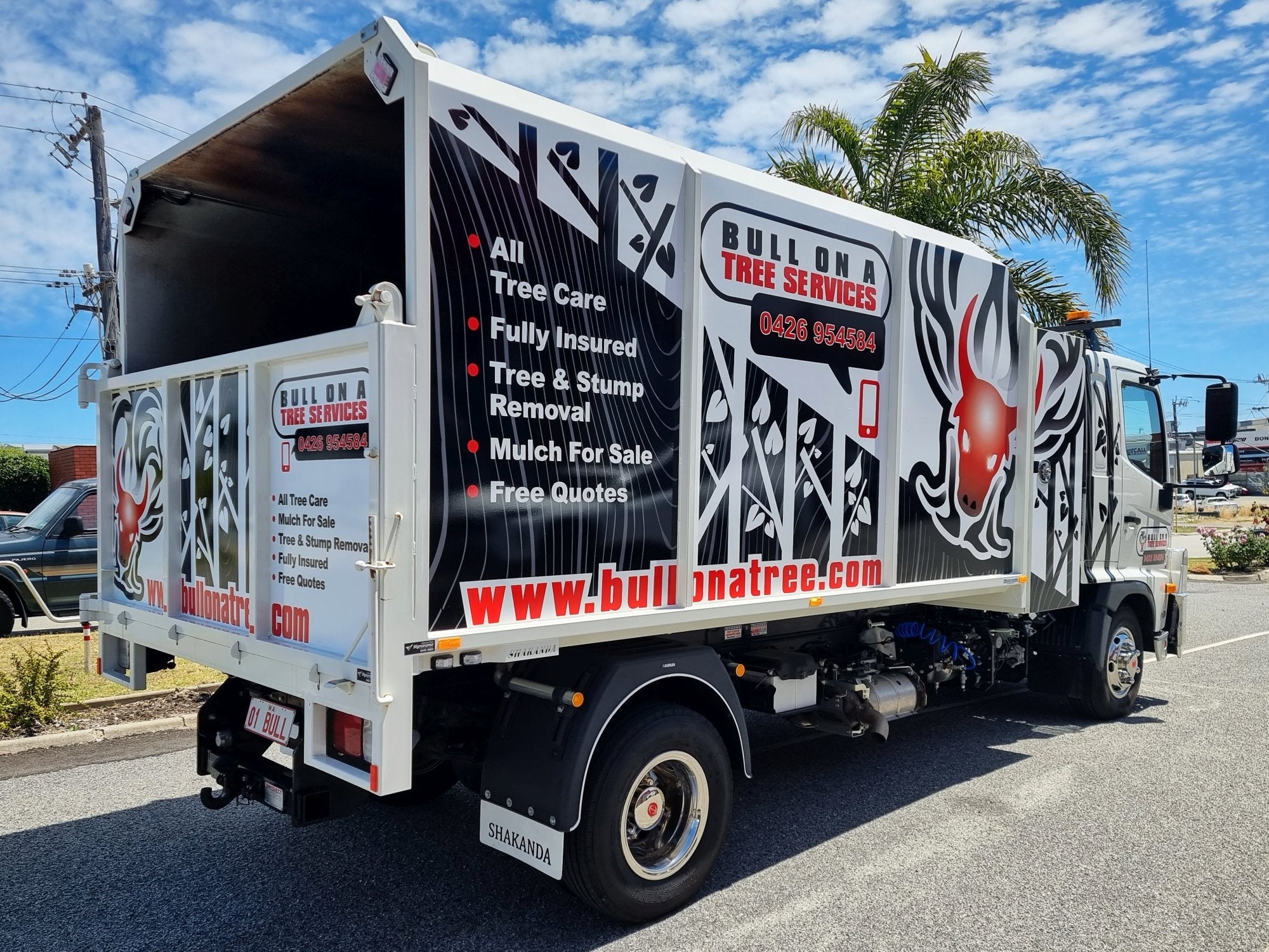 Bull On A Tree Truck Wrap