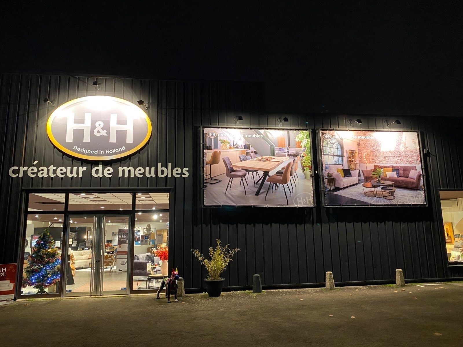 Conception d'une nouvelle Enseigne et nouveaux visuels sur bâches tendues pour H&H Le Mans par Signarama Le Mans
