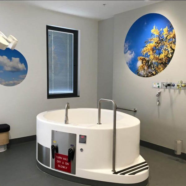 Wall Decals of the sky and clouds inside of a health practice room