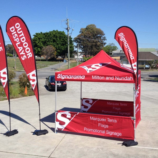 Signarama branded marquee and tear drop banners for a store