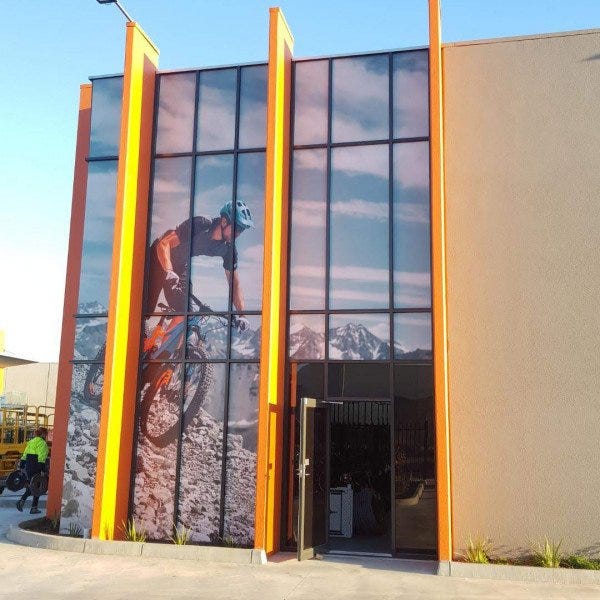 Large Format Printing was used to create this massive mountain biker graphic on the side of this building