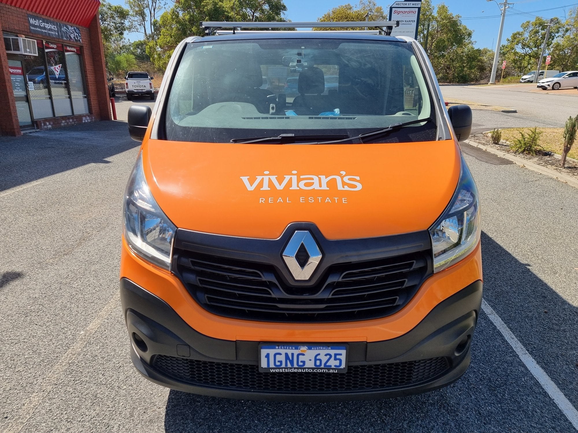 Vivian's Real Estate Van Wrap