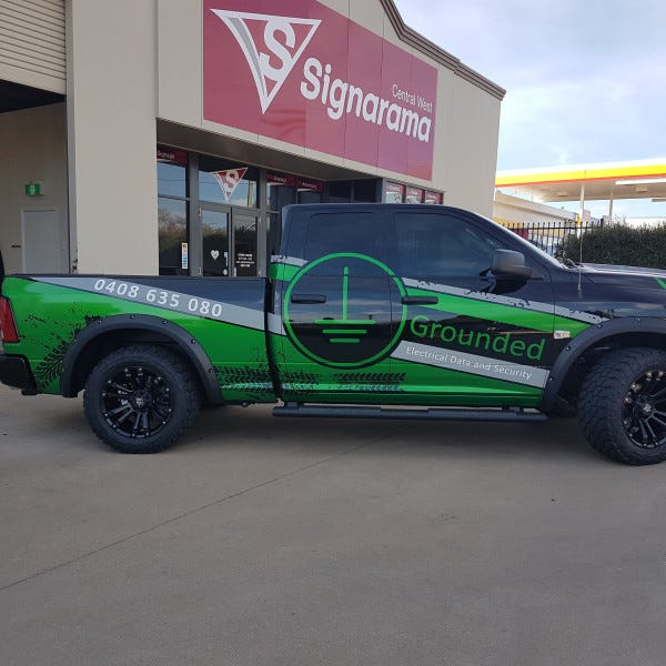 Signarama Orange. RAM Chrome Wrap