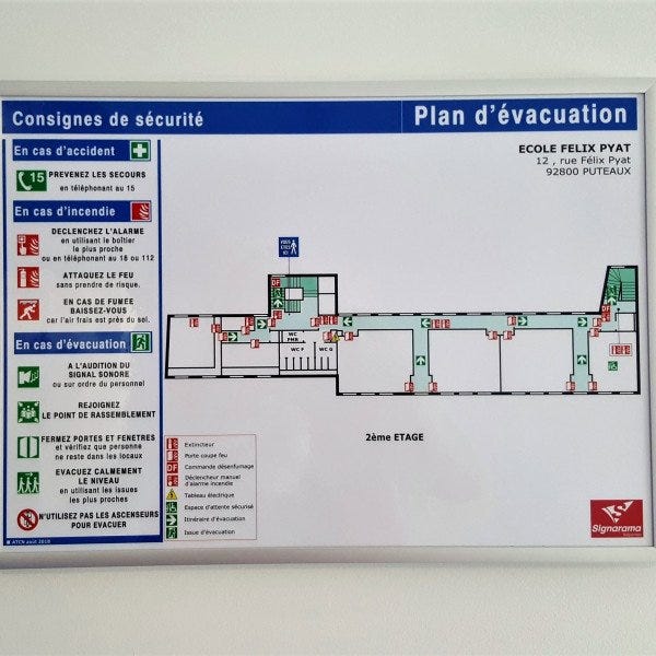 Plan d'évacuation dans cadre Alu. Réalisation Signarama Valparisis(95)
