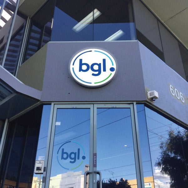 Circular light box for business entrance | Signarama