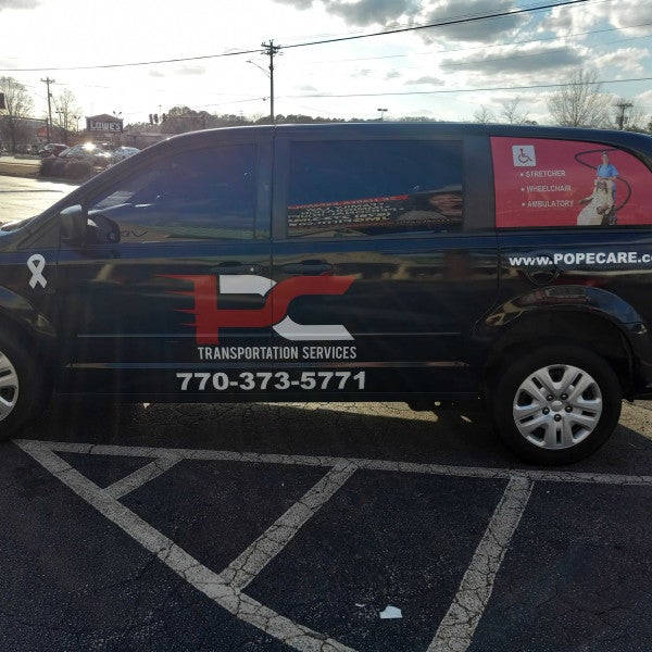 Pope Cares Vinyl Graphics and Window Perforation