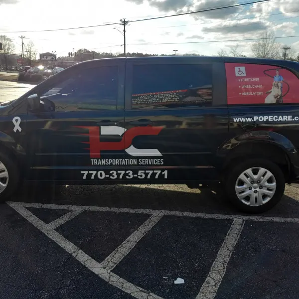 Pope Cares Vinyl Graphics and Window Perforation