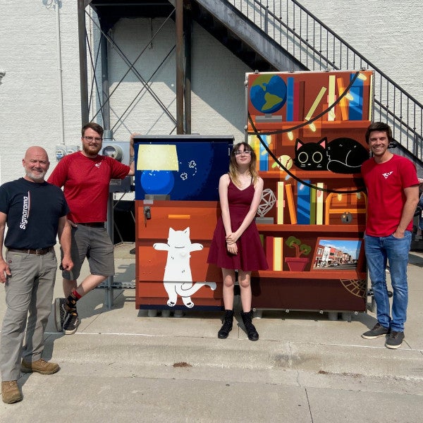 Team with Utility Box wraps Signarama Liberty MO