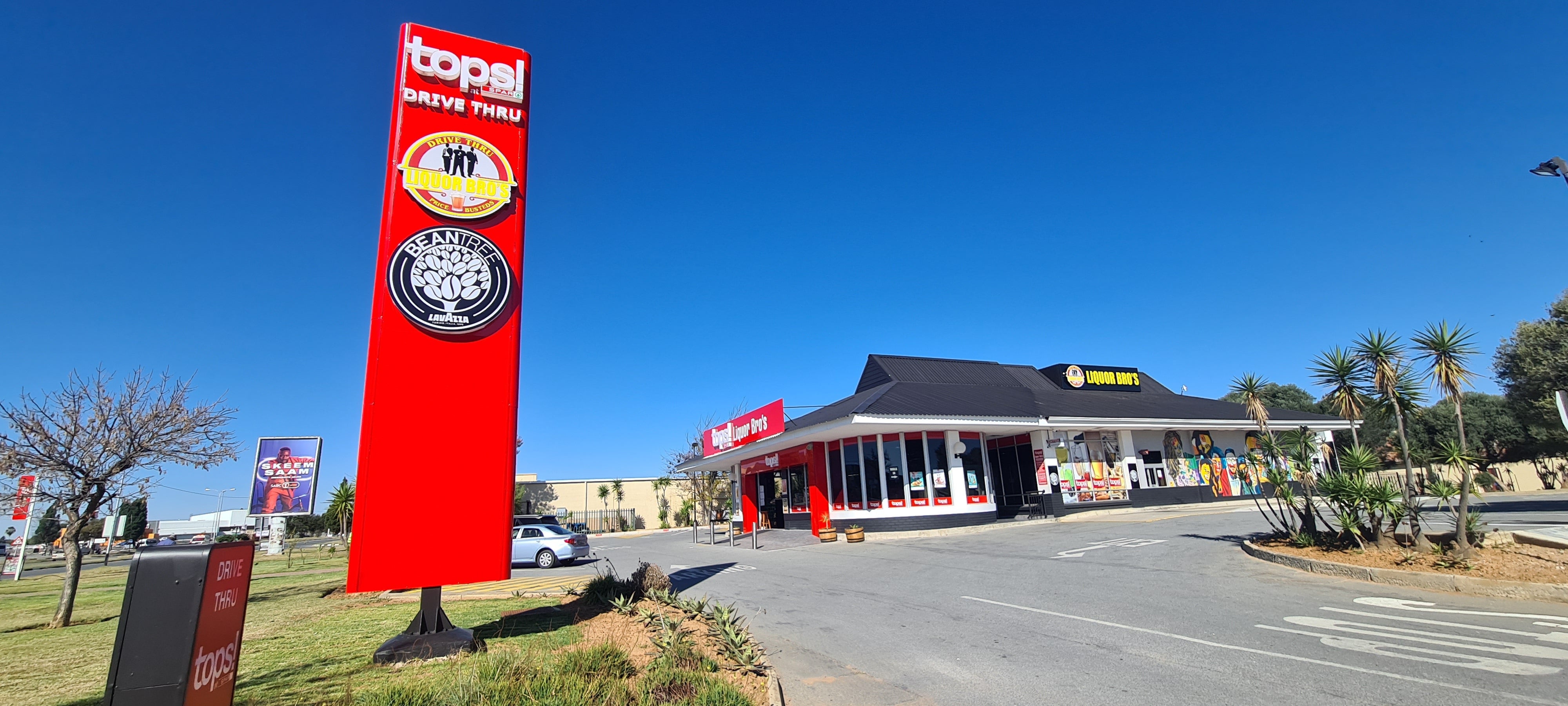 Retail and pylon sigange for Tops Spar