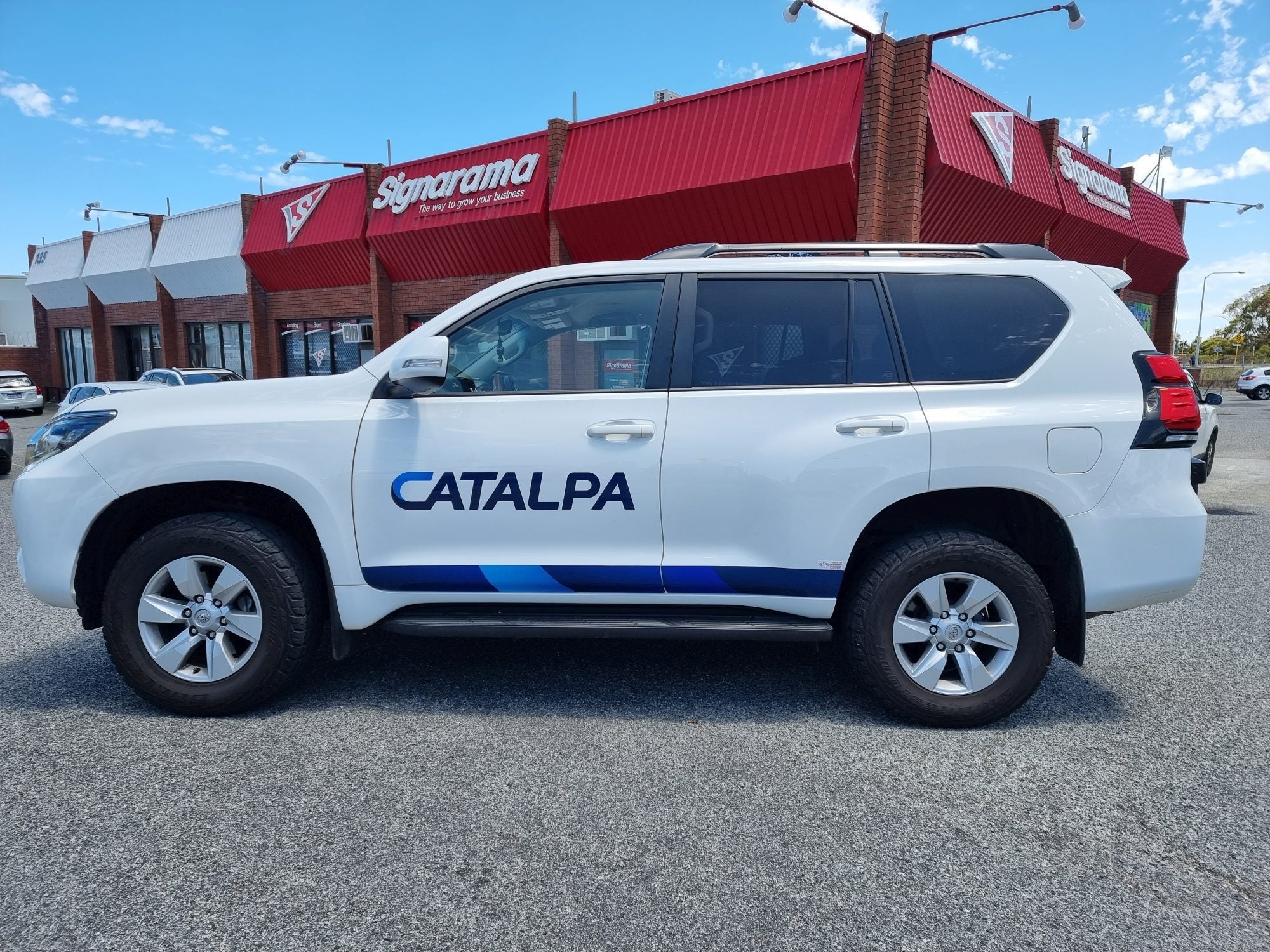 Catalpa Group Building and Vehicle Signage