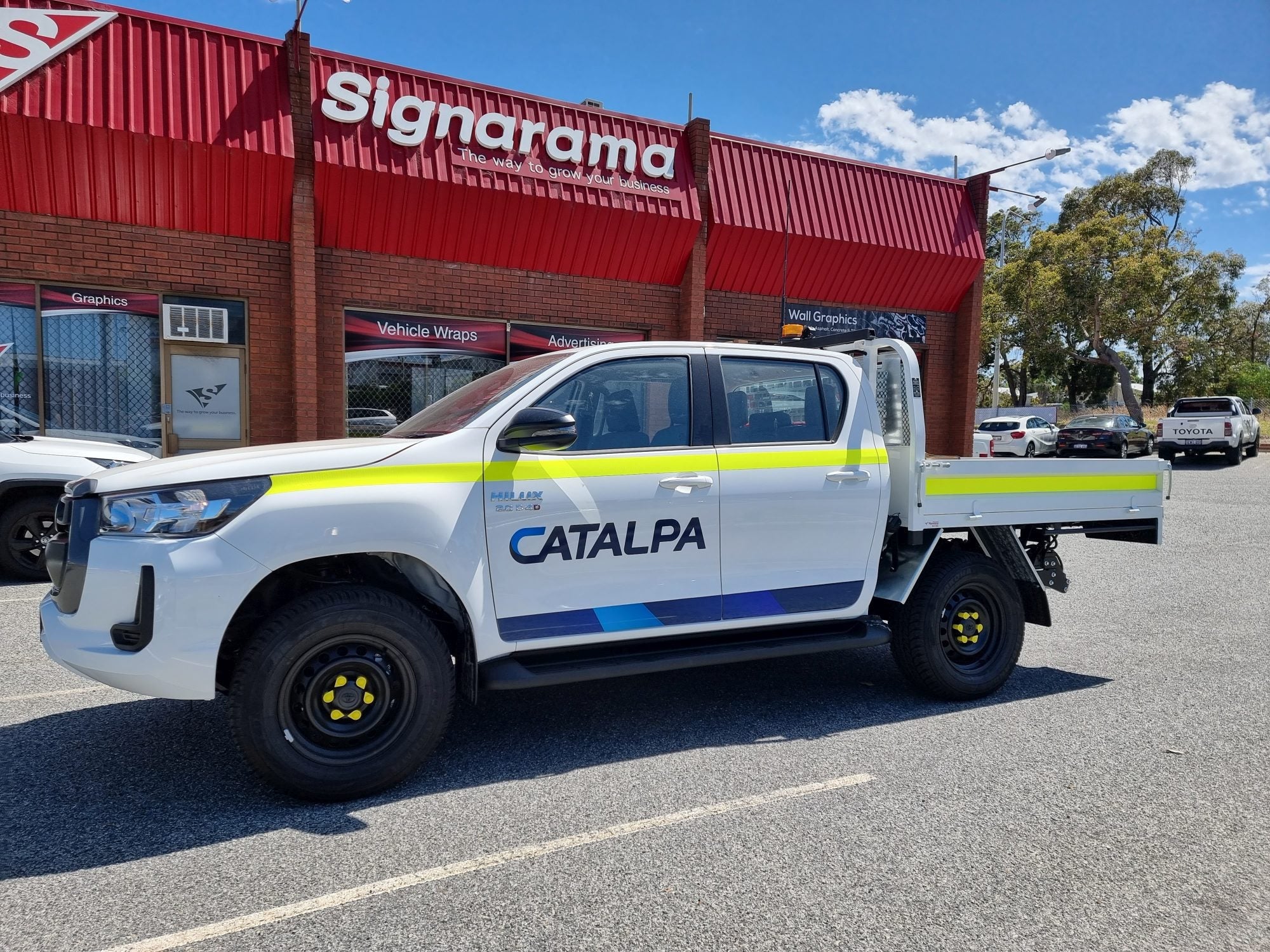 Catalpa Group Building and Vehicle Signage