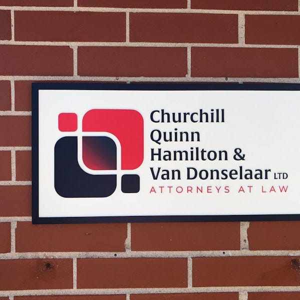 cast bronze plaque with custom painted colors Churchill law firm wall mounted signarama grayslake