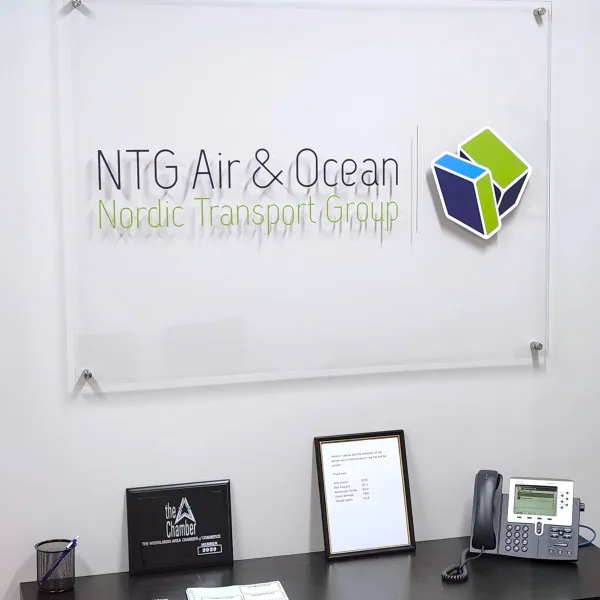 clear acrylic backer with digitally printed contour cut vinyl logo with standoffs