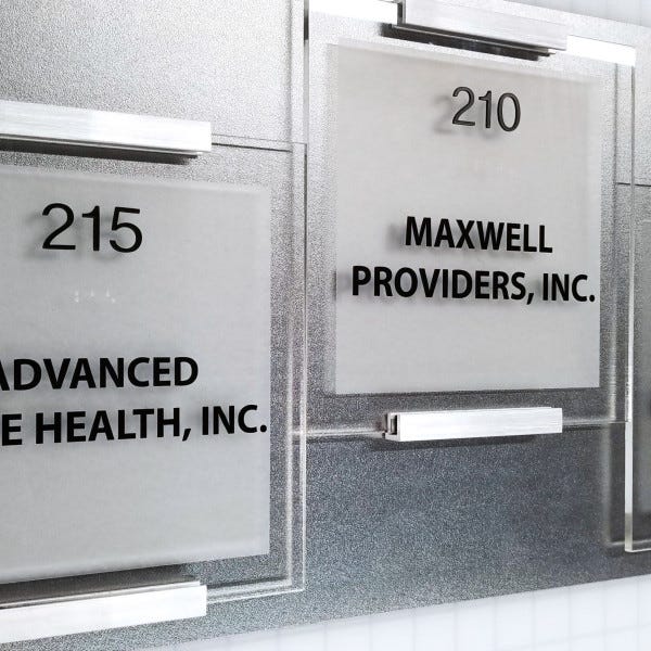 custom acrylic with cut black vinyl and custom mounting door signs