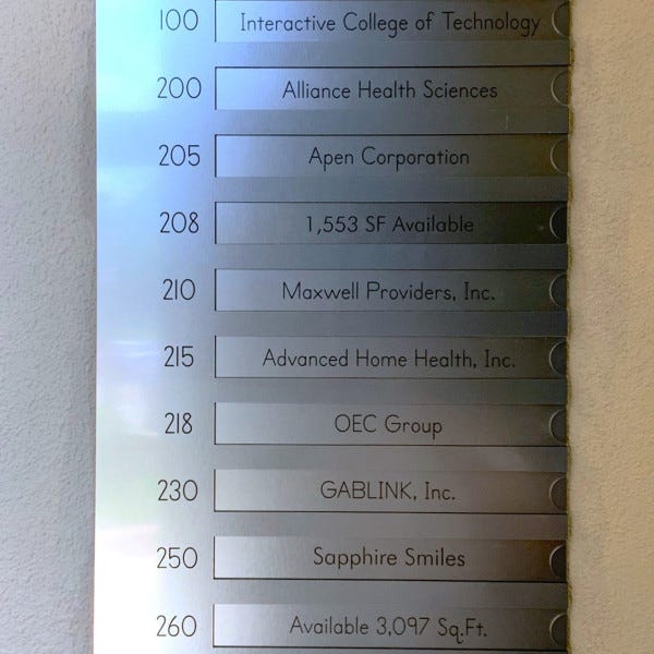 custom directory sign measuring 18 x 32 in. black acrylic and brushed aluminum