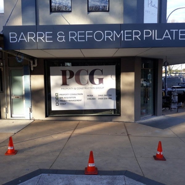Awning Signs, wall signs and window at The Pilates