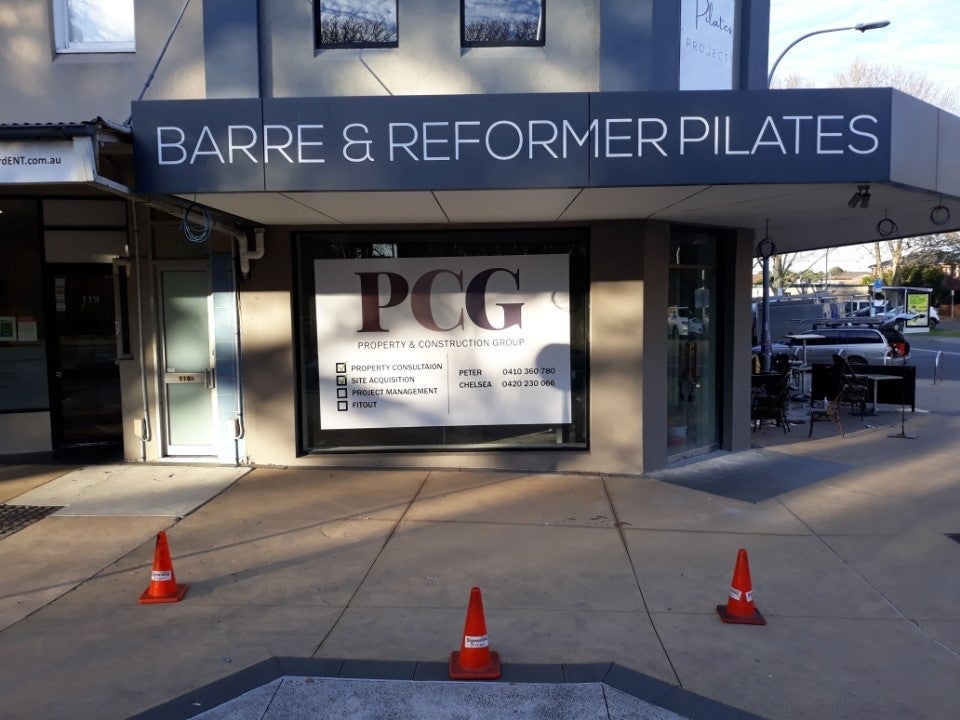 Awning Signs, wall signs and window at The Pilates