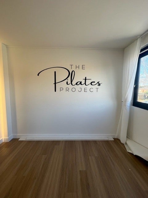 Awning Signs, wall signs and window at The Pilates