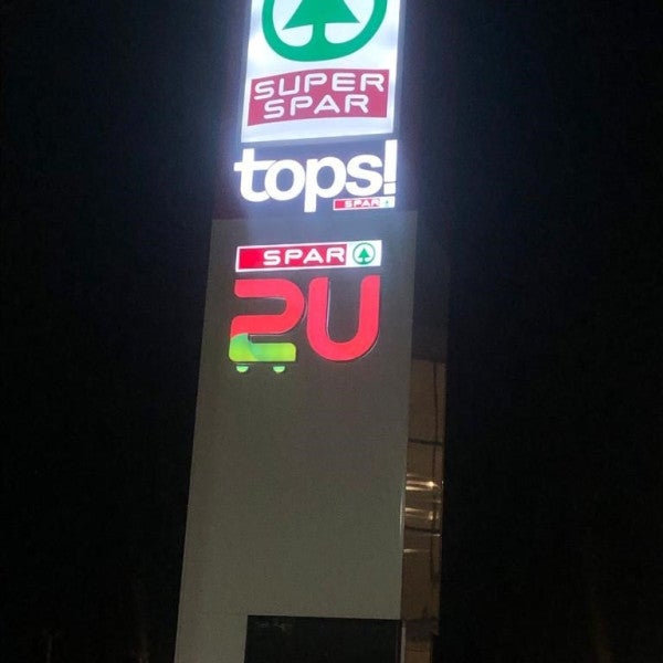 Illuminated pylon signage for Tops Spar