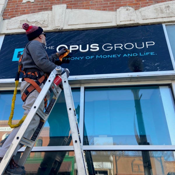Cleaning Opus sign Signarama Liberty Kansas City