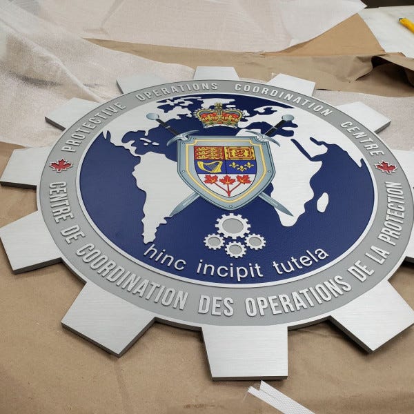 RCMP brushed aluminum plaque-2ft cog, recessed -paintedandprinted