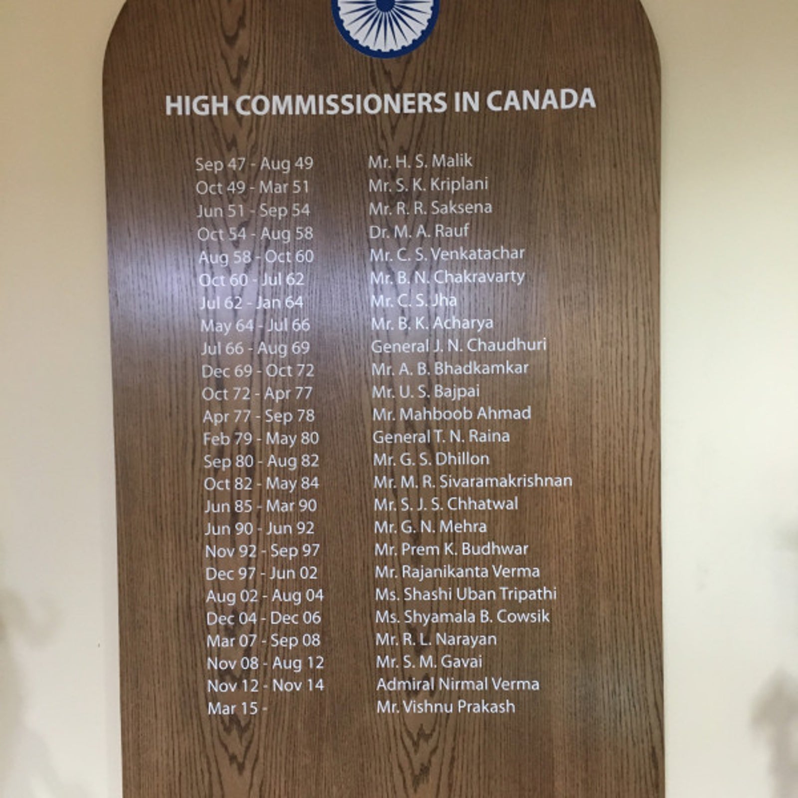 oak wood cut- stained- vinyl letters wall board-india embassy