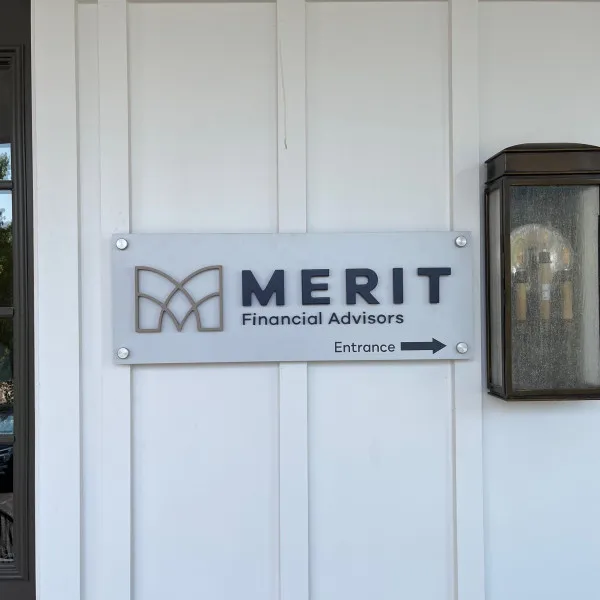 Acrylic standoff office sign with logo for Merit Financial Advisors