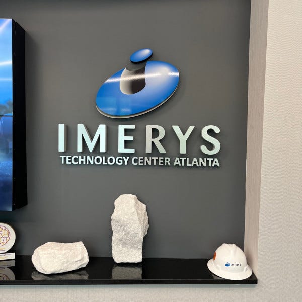 Dimensional lobby sign with custom logo for Imerys Technology Center Atlanta