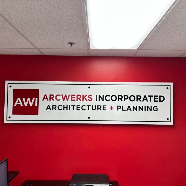 Vinyl and acrylic company sign
