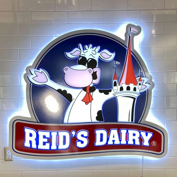 REIDS DAIRY ILLUMINATED SIGN