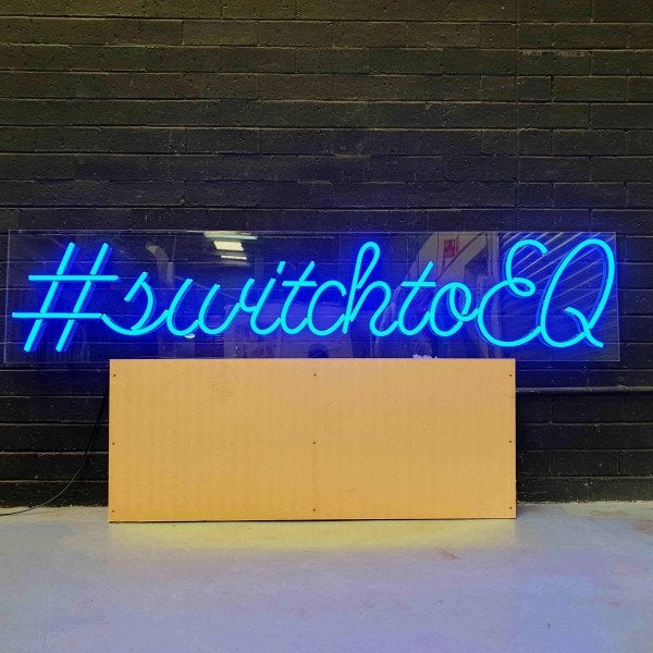 Blue LED Neon sign on a black brick wall | Neon Signs | LED Neon Flex Signs