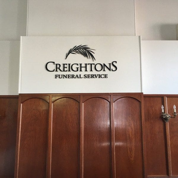 Creightons Funeral Service Sign