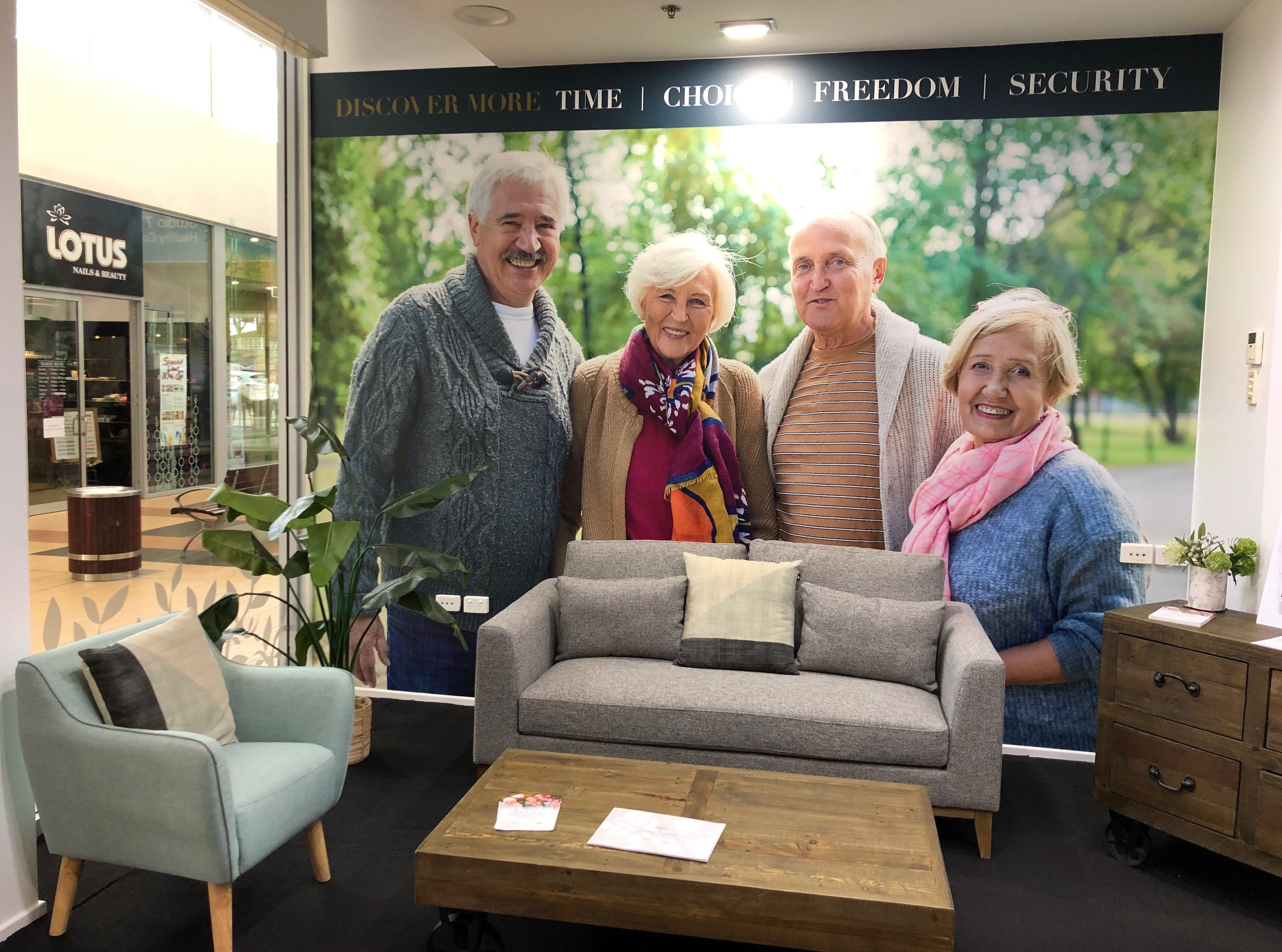Wall Graphic in waiting area with image of happy people together
