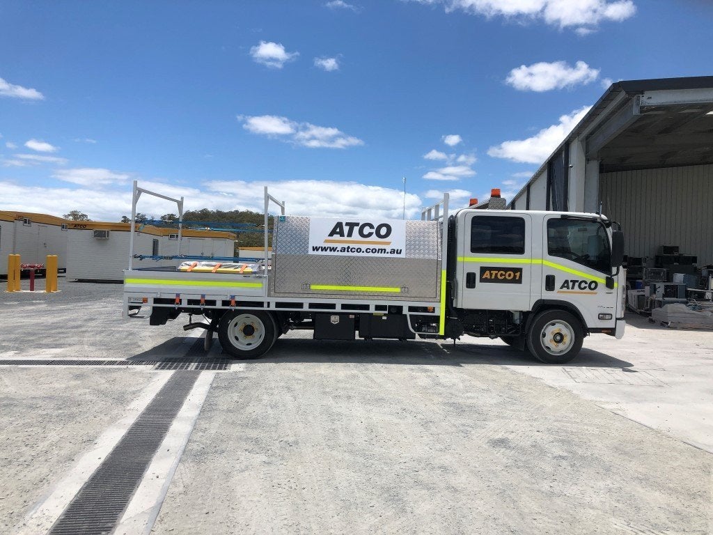 Reflective Vehicle Signage on a truck with reflective tape required on a work site | Signarama
