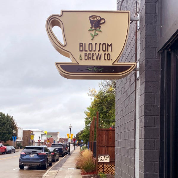 Blossom & Brew Projecting Sign Photo 2